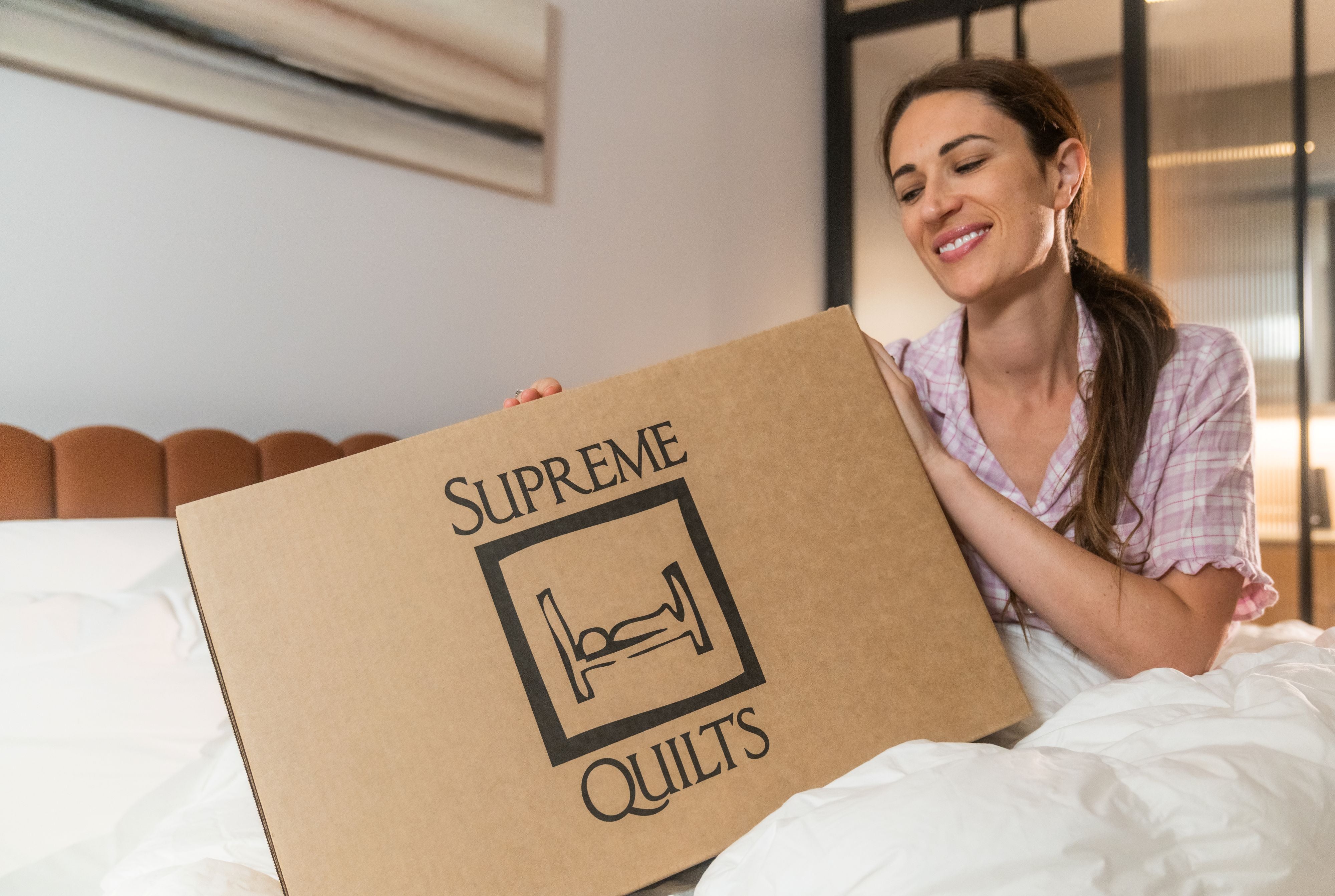 Supreme Quilts white down quilt featuring soft loft, luxurious warmth & elegant comfort in a tranquil setting.